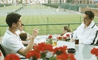 Tom Hewett (Matthew Goode) befriends Chris at the tennis club