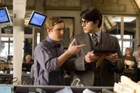 Jimmy Olsen and Clark Kent in the Daily Planet newsroom