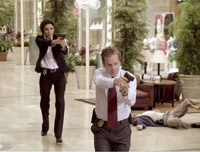 Agents Jill Marin (Eva Longoria) and David Breckinridge pursue an assassin