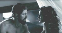Leonidas (Gerard Butler) seeks the counsel of his wife and queen, Gorgo (Lena Headey)