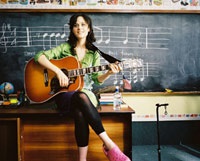 Zooey Deschanel as the semi-hippie-ish Miss Edmunds