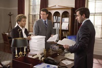 Congressman Baxter with his assistant (Wanda Sykes) and chief of staff (John Michael Higgins)