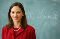 Hilary Swank as Erin Gruwell, a young teacher in a difficult classroom