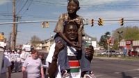 John Bul Dau on a refugee awareness walk in Syracuse