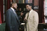 Forest Whitaker (left) as stern theologian James Farmer Sr.