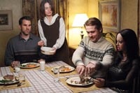 Gus (Paul Schneider) and Karin (Emily Mortimer) are shocked by Lars' dinner guest