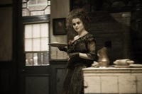Helena Bonham Carter as Mrs. Lovett, Sweeney's pie-making accomplice