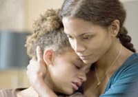 Halle Berry as Audrey Burke, comforting her daughter (played by Alexis Llewellyn)