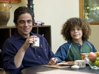 Benicio Del Toro as Jerry Sunborne, sharing a moment with Audrey's son Dory (Micah Berry)
