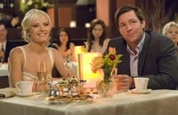 Tess (Malin Akerman) and George (Edward Burns), newly engaged