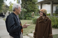 Director Clint Eastwood on the set with Jolie