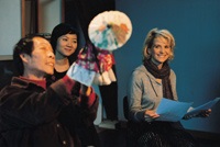 Director Hou Hsiao Hsien on the set with Song Fang and Binoche