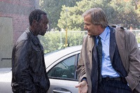 Samir with CIA man Carter (Jeff Daniels)