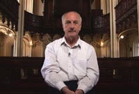 The pedophile priest, interviewed in a church