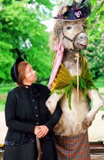 The magical caretaker can even make donkeys dance