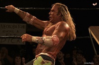 Randy gets bloodied and bruised in the ring