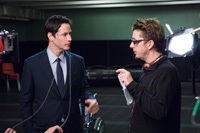 Derrickson (right) on the set with Keanu Reeves