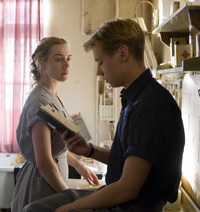 Kate Winslet as Hanna Schmitz, David Kross as Michael