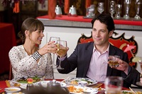 Zooey (Rashida Jones) and Peter toast