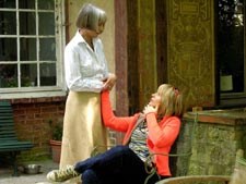 Adrienne visits with her mother (Edith Scob)