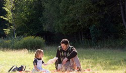 Henry visits a younger version of Clare (Brooklynn Proulx)