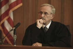 Dick Smothers as Judge Harold Baker