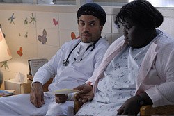 Nurse John (Lenny Kravitz) with Precious