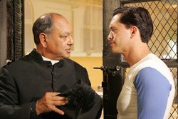 Padre Esteban (Cheech Marin) gives Cesar some advice