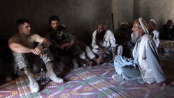Captain Dan Kearney meets with local Afghan elders in the Korengal Valley