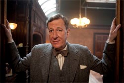 Geoffrey Rush as Lionel Logue