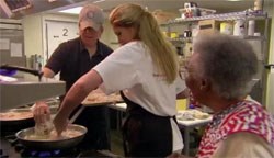 Johnson cooking at the Love Kitchen