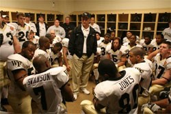 Michael Harding as Coach Jim Grobe