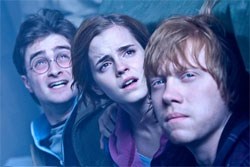 Daniel Radcliffe as Harry, Emma Watson as Hermione, Rupert Grint as Ron