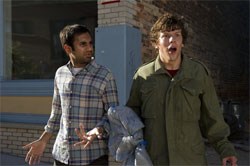 Aziz Ansari (left) as Chet, with Eisenberg