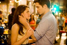 Kristen Stewart as Bella, Robert Pattinson as Edward