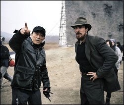 Director Zhang Yimou on the set with Bale