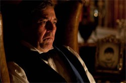 Ciarán Hinds as Sam Daily