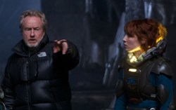 Director Ridley Scott on set with Noomi Rapace