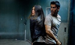 Melina (Jessica Biel) and Doug on the run