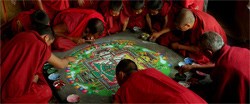 Buddhist monks and a communal work of art