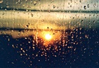 Sun behind the Rain
