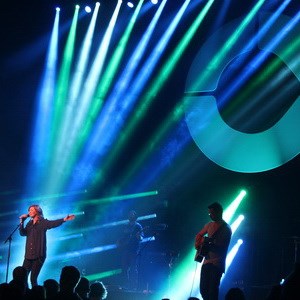 Top: Chris Quilala and Kim leading worship at a Jesus Culture One Night event in Chicago; Middle: Kim and husband Skyler's first collaborative album, Home; Above: Kim and Skyler leading worship with Jesus Culture, April 2013