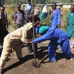 Women drilling for a well