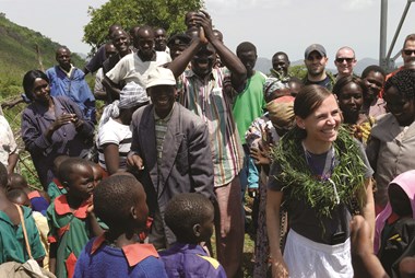 Wendy Ploegstra with villagers at a local water project. (Photo courtesy of Chad Dykstra)