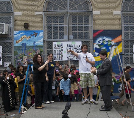 Jay and other community leaders mark the completion of the school Welcome mural in 2011.