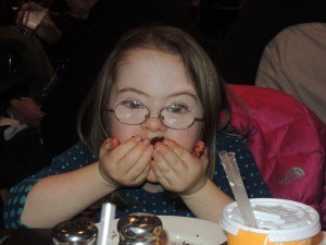 Enjoying a cupcake on her 8th birthday