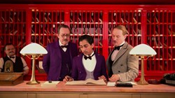 Owen Wilson, Tom Wilkinson, and Tony Revolori in 'The Grand Budapest Hotel'