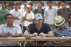 Jon Hamm and J.K. Simmons in 'Million Dollar Arm'