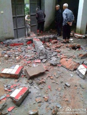 A cross removed and destroyed from a Zhejiang church A cross removed and destroyed from a Zhejiang church