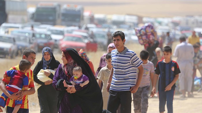 Thousands Flee as Terrorists Take Over Iraq's Christian Heartland